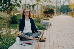 calm-business-woman-meditating-in-lotus-outdoors
